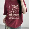 Urban Oversized Graphic T-Shirt – Burgundy "Embrace the Future" Tee